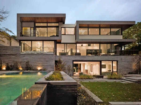 A couple looking at houses on a laptop